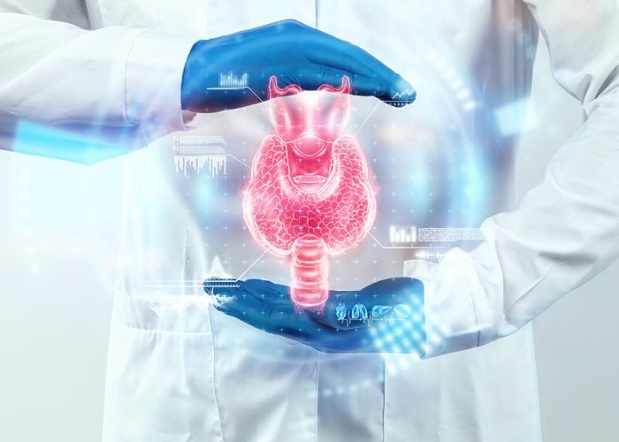 Thyroid gland, Doctor looks at a hologram or ultrasound of the patient's thyroid gland. Ultrasound diagnostics, thyroid diseases, medical indicators